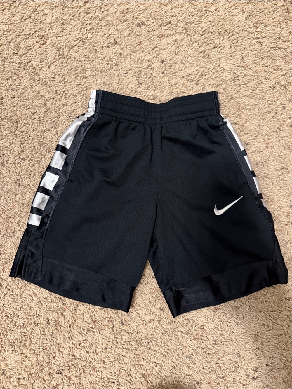 Nike Black Athletic Shorts with White Swoosh and Silver Side Panels